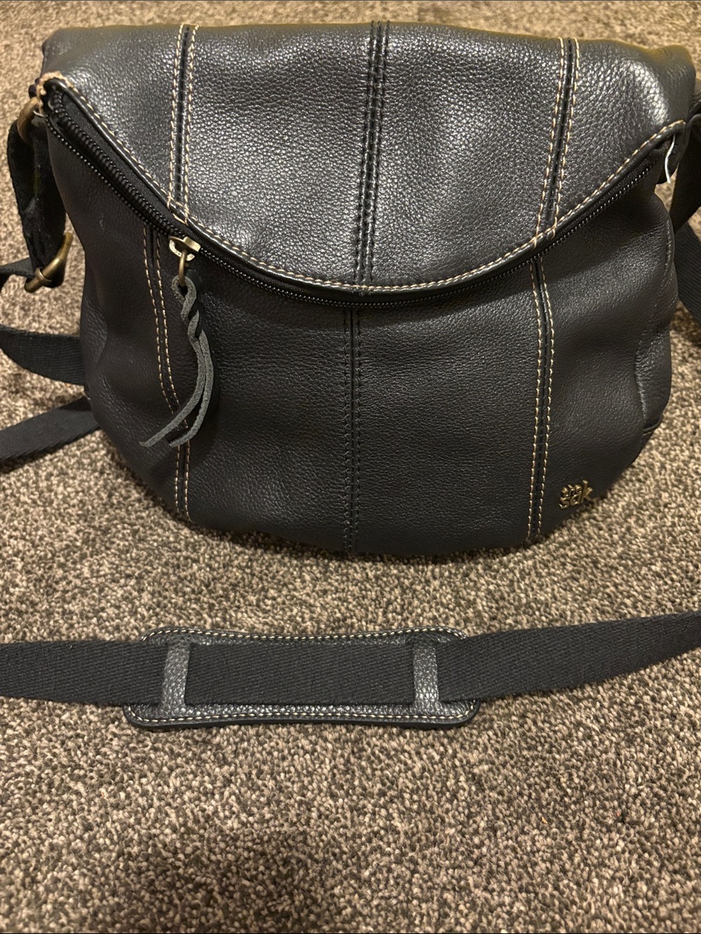 The Sak Black Leather Crossbody with Bronze Stitching and Gold Logo